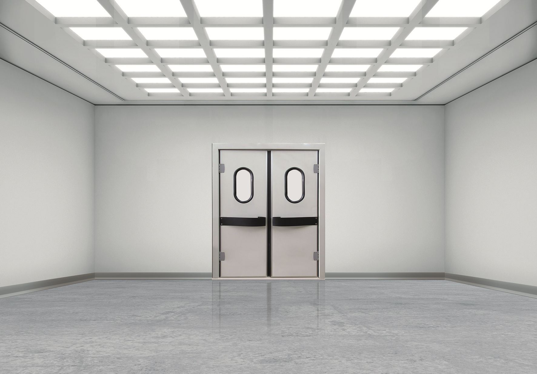 Clean, empty room with double swing doors and bright grid ceiling lights.