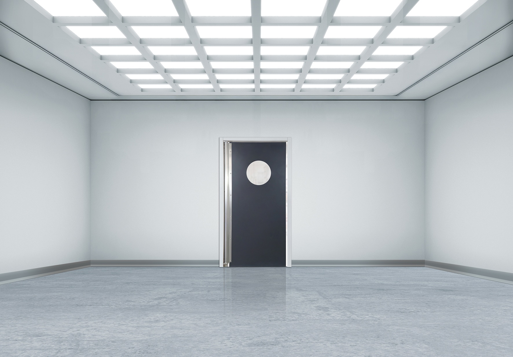 Minimal white room with grid lights and a black door with round window