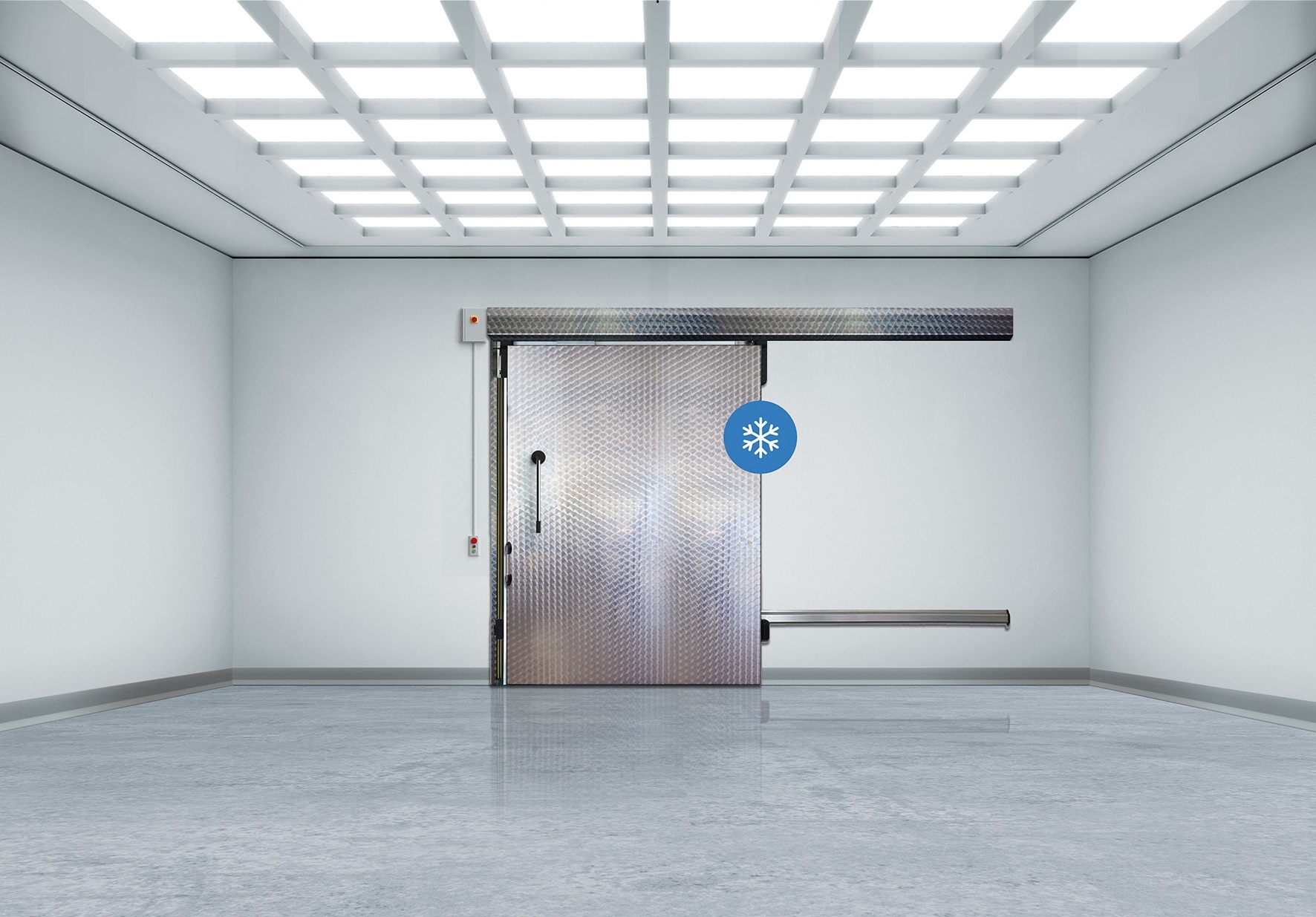 Empty industrial room with sliding metal freezer door, snowflake symbol