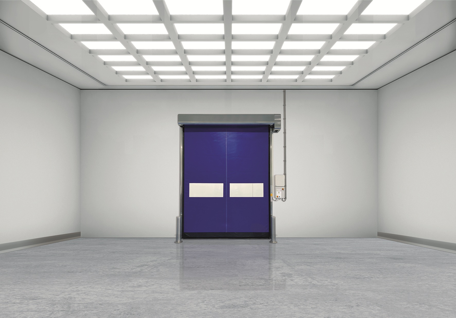 Cleanroom with purple high-speed roll-up door and grid ceiling lights